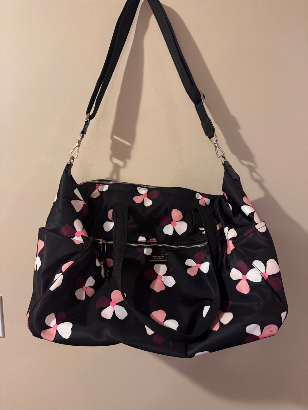 Kate Spade Dawn Dusk Buds Weekender Bag in black with pink floral - Picture 3 of 10